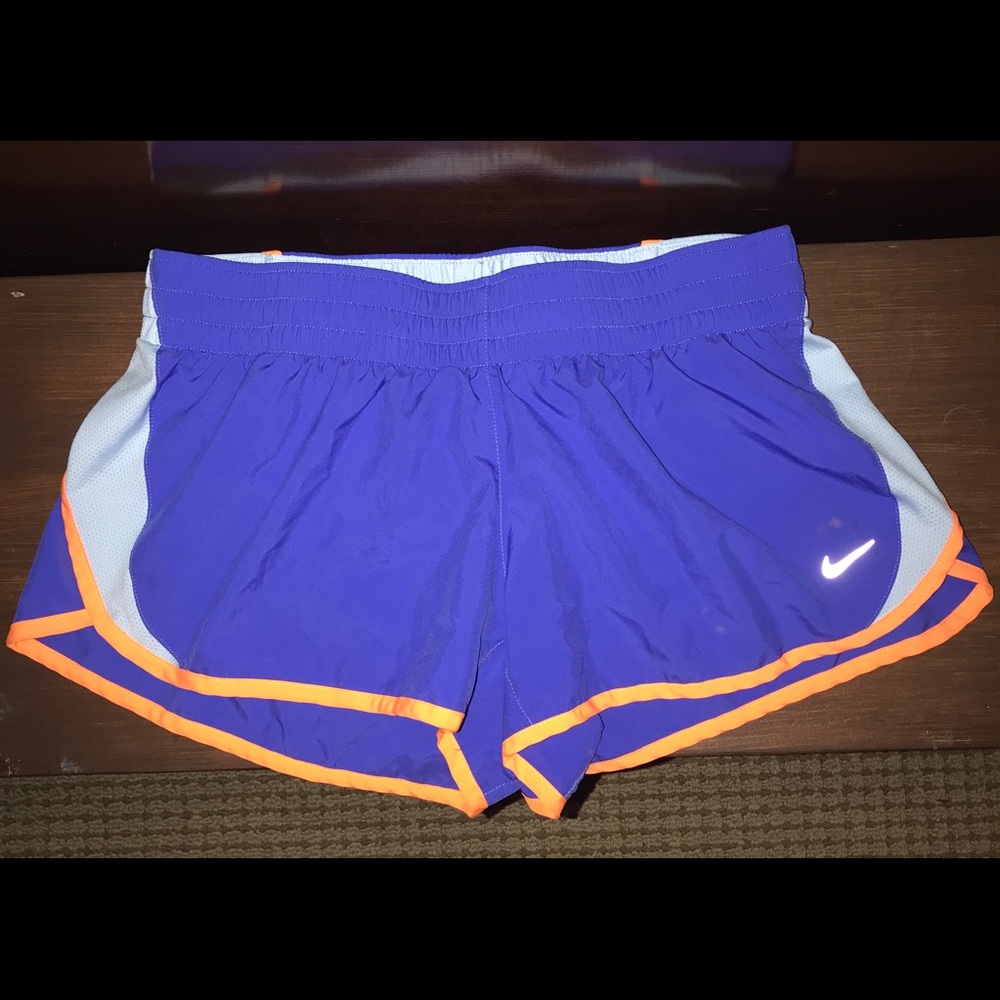 Orange and blue nike shorts. Size large.